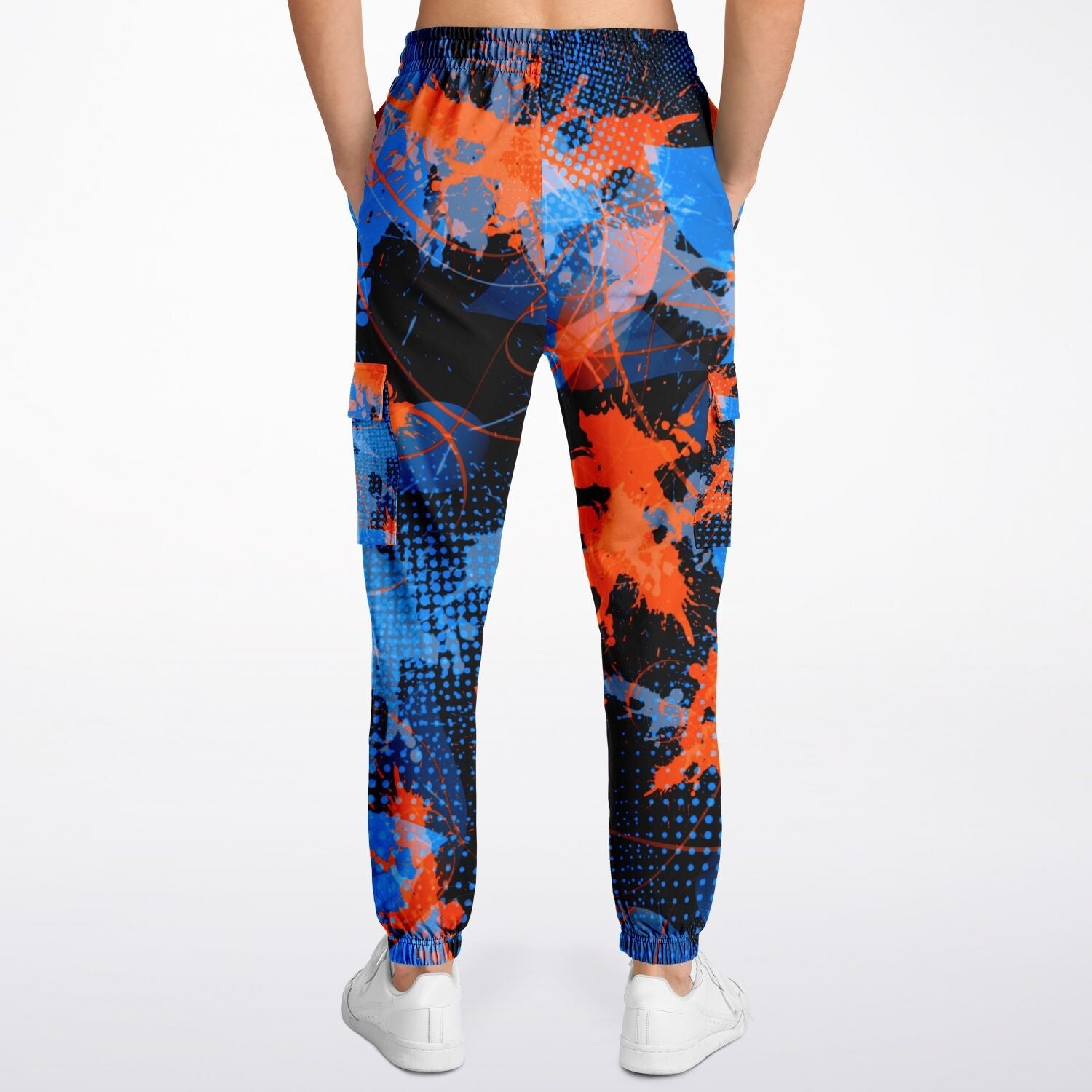 Colorful splatter-patterned jogger pants on a white background