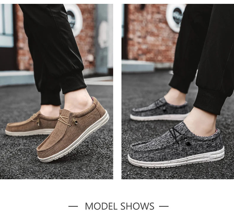 Two pairs of shoes worn by a person on a pavement with a blurred background.