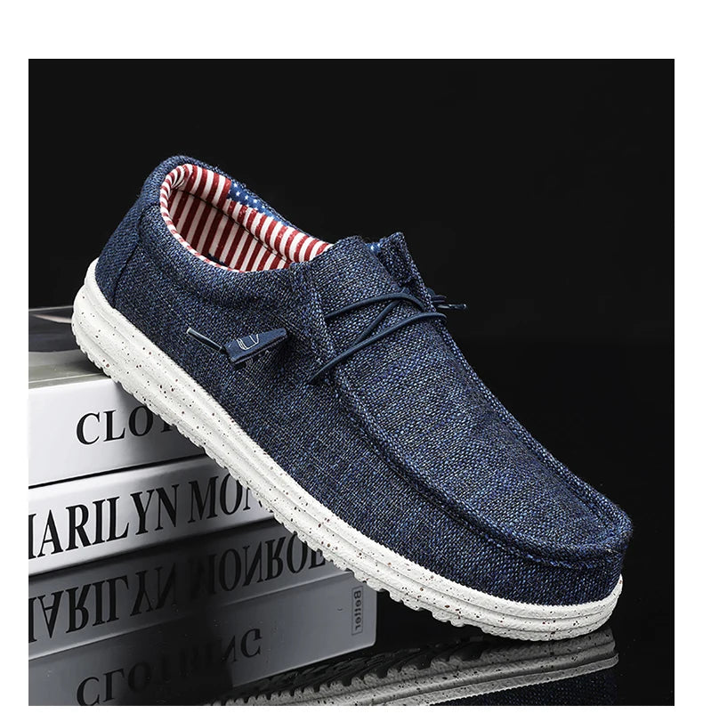 Blue casual shoe with white sole on a black background