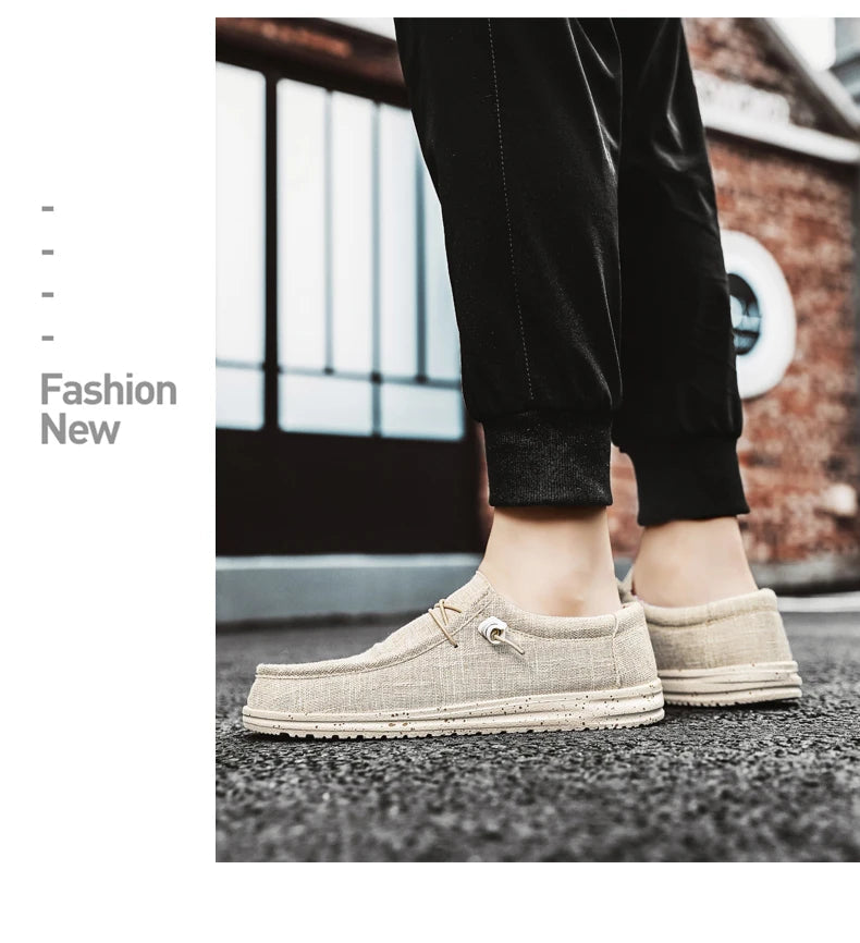 Beige loafers worn by a person with a blurred background