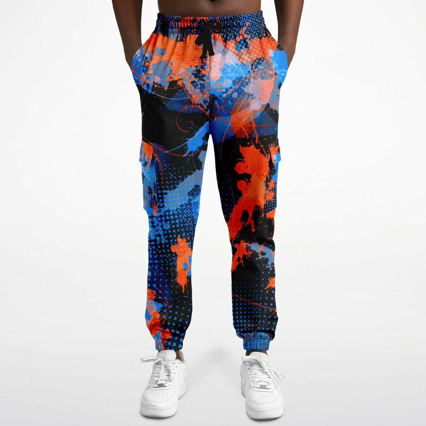 Colorful splatter-patterned pants worn by a person on a white background