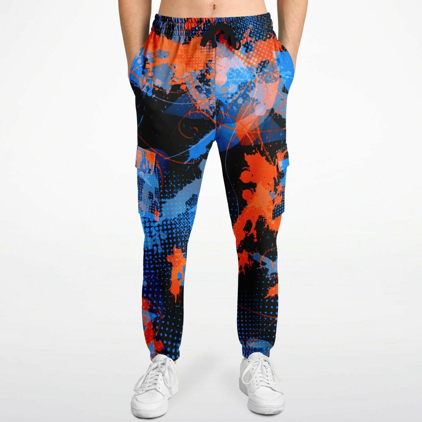 Colorful abstract-patterned pants worn by a person on a white background