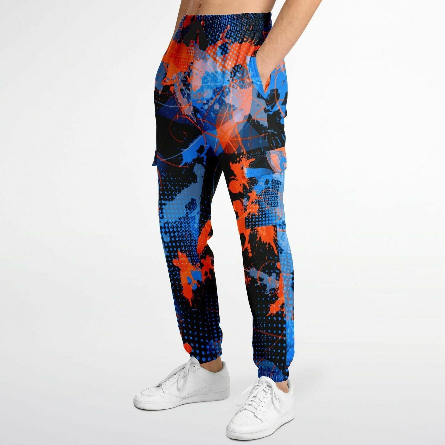 Colorful abstract-patterned pants worn by a person on a white background